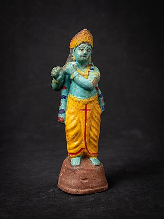 Antiek aardewerk beeld van Krishna