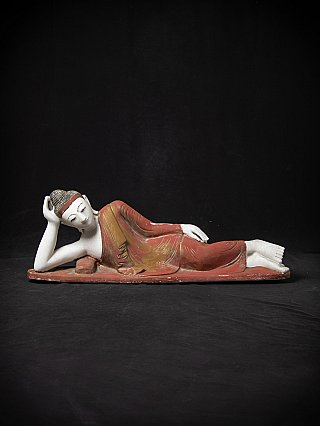 Reclining marble Buddha statue from Burma (Myanmar), full side view with red robe