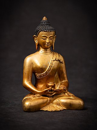 Old bronze Nepali Buddha statue
