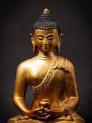 Old bronze Nepali Buddha statue