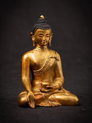Old bronze Nepali Buddha statue