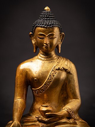 Old bronze Nepali Buddha statue