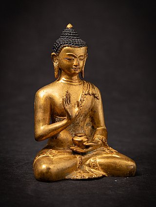 Old bronze Nepali Buddha statue
