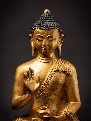 Old bronze Nepali Buddha statue