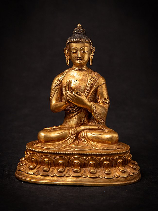 Old bronze Nepali Buddha statue