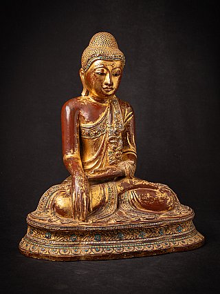 Antique wooden Burmese Mandalay Buddha statue