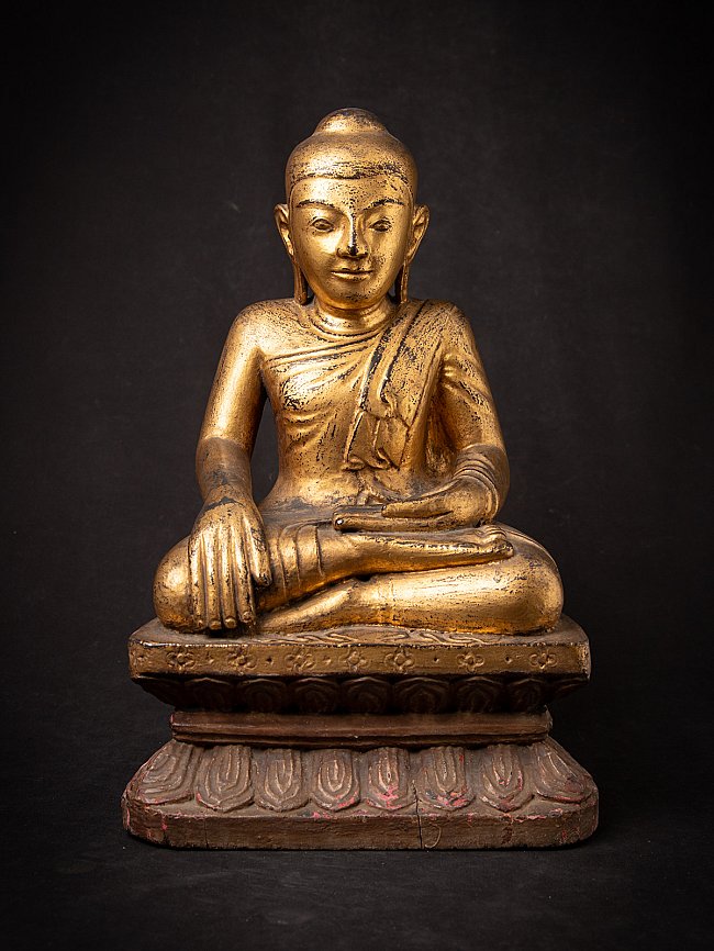 Antique wooden Burmese Buddha statue