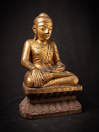 Antique wooden Burmese Buddha statue