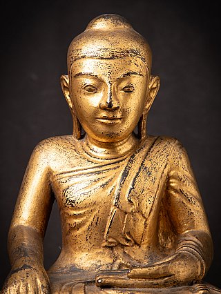 Antique wooden Burmese Buddha statue