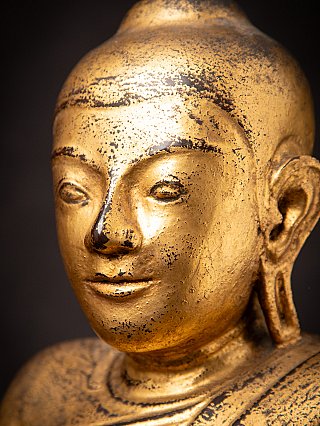 Antique wooden Burmese Buddha statue
