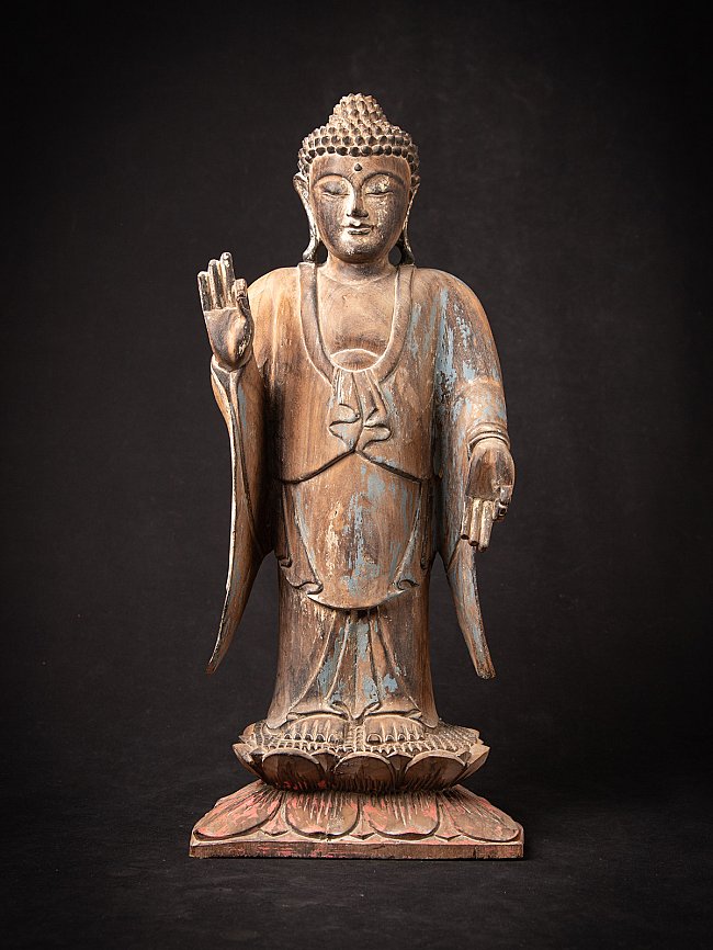 Old wooden Thai Buddha statue