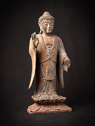 Old wooden Thai Buddha statue