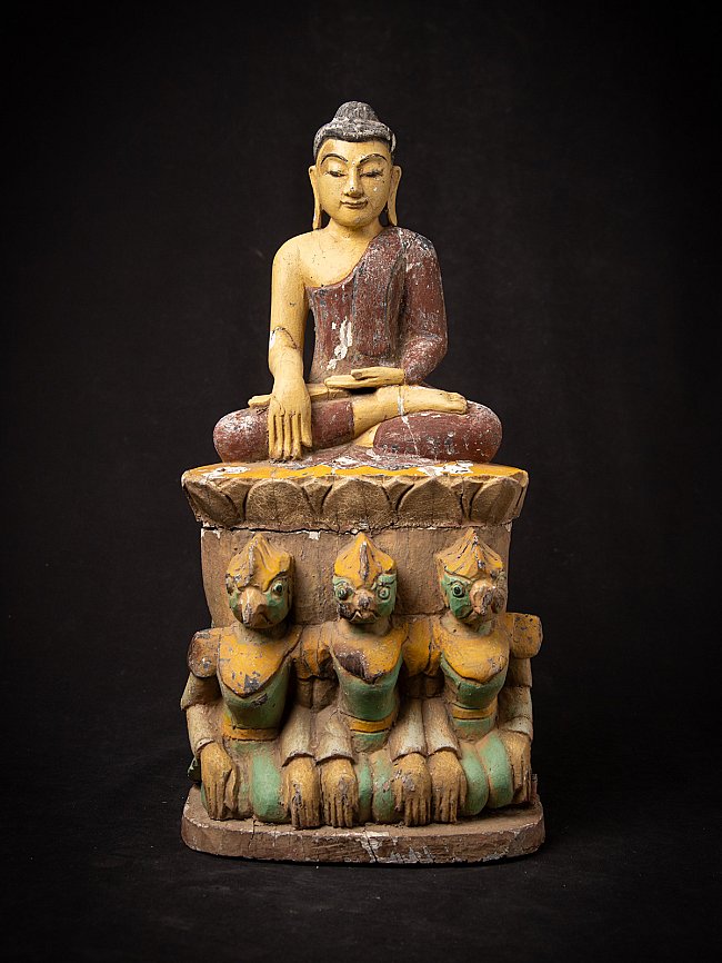 Old Burmese Buddha - seated on Garuda statues
