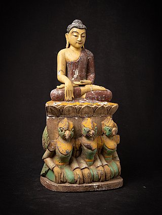 Old Burmese Buddha - seated on Garuda statues