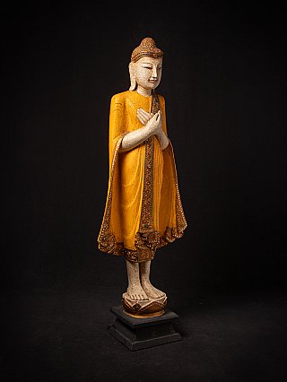 Wooden standing Thai Buddha statue