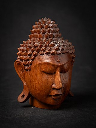 Newly made teakwooden Buddha head