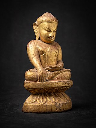 Antike hölzerne burmesische Buddhafigur