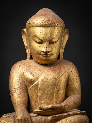 Antike hölzerne burmesische Buddhafigur