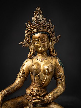 Old bronze Nepali Basundhara statue