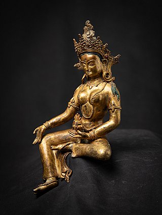 Old bronze Nepali Basundhara statue