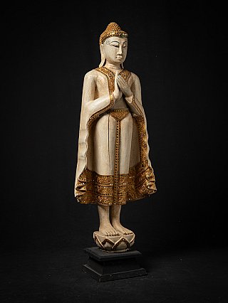 Wooden standing Thai Buddha statue