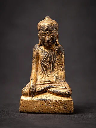 Antique wooden Burmese Buddha statue