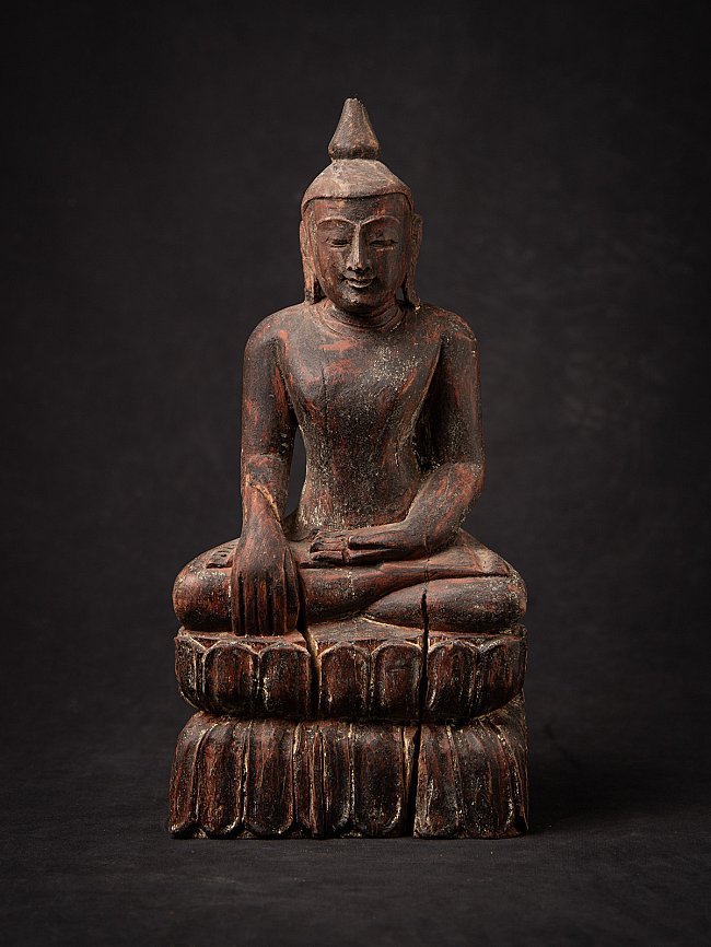 Wooden Burmese Buddha statue seated in bhumisparsha mudra, full front view