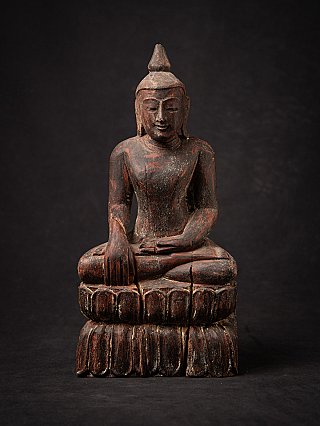 Wooden Burmese Buddha statue seated in bhumisparsha mudra, full front view