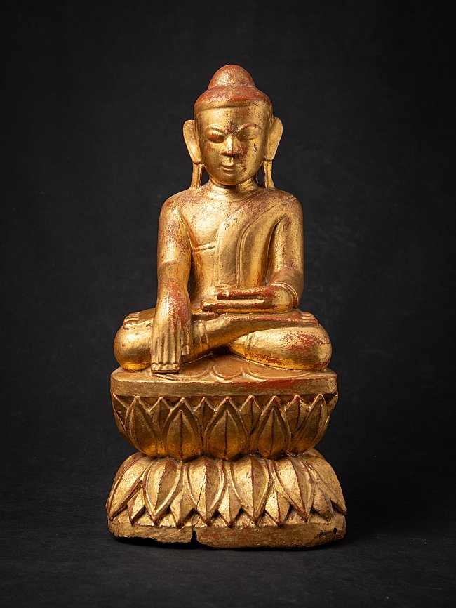 Antike hölzerne burmesische Buddhafigur