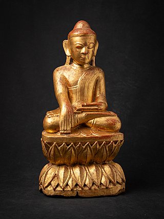 Antike hölzerne burmesische Buddhafigur