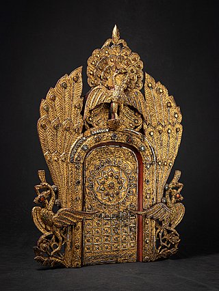 Antique Burmese wooden temple panel