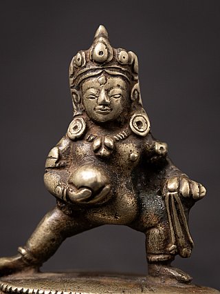 Antique Tibetan silver statue of Jambhala