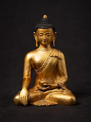 Old bronze Nepali Buddha statue