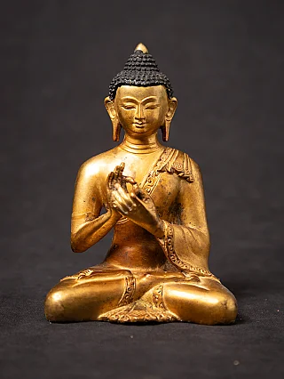 Old bronze Nepali Buddha statue