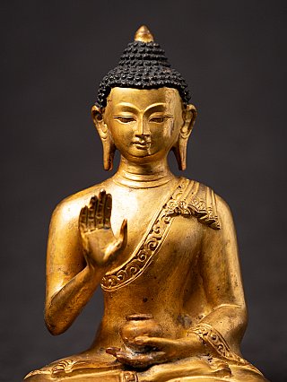 Old bronze Nepali Buddha statue