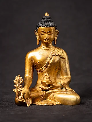 Old bronze Nepali Medicine Buddha statue