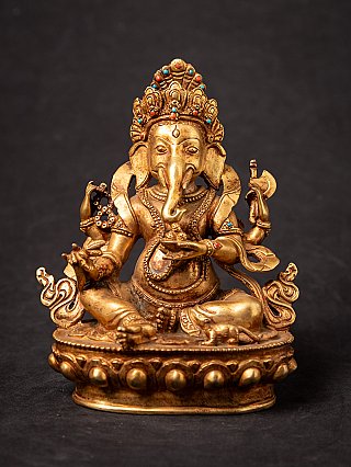 Nepali bronze Ganesha statue seated on a lotus base, full front view