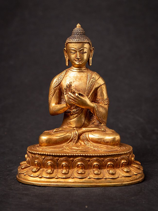 Old bronze Nepali Buddha statue