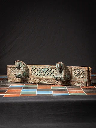 Antique Indian temple panel with two horse heads