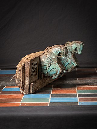 Antique Indian temple panel with two horse heads