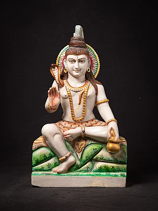Marble Shiva statue from India, seated with raised hand and snake, full front