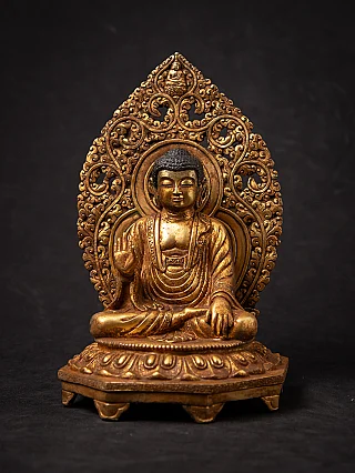 Old bronze Japanese Amida Buddha statue