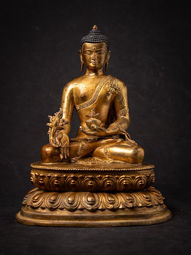 Old bronze Nepali Medicine Buddha statue