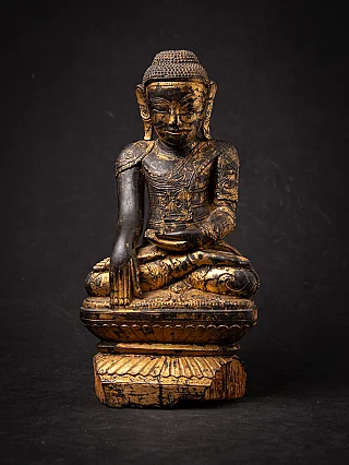 Antique wooden Burmese Buddha statue