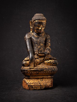 Antike hölzerne burmesische Buddhafigur