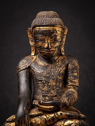 Antike hölzerne burmesische Buddhafigur