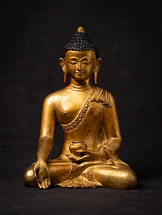 Old bronze Nepali Buddha statue