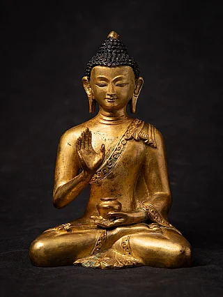 Old bronze Nepali Buddha statue