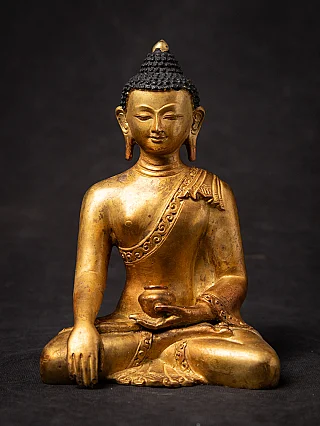 Old bronze Nepali Buddha statue