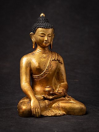 Old bronze Nepali Buddha statue